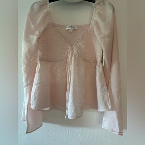 Trixxi pastel pink medium long-sleeved blouse, V-neck New with tags.